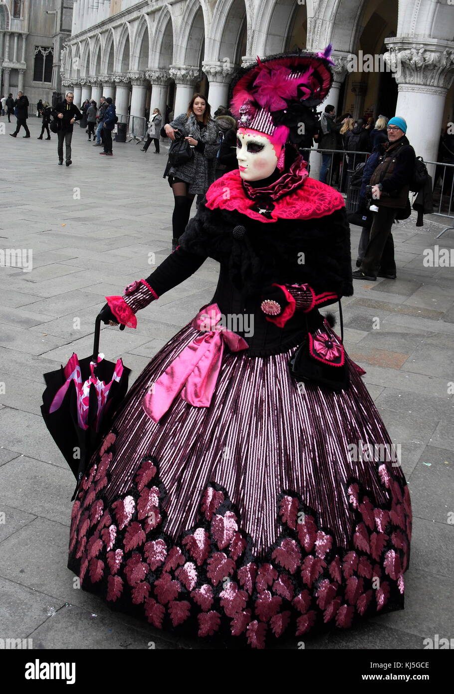 Costumed attendee at the Venice Carnival (Carnevale di Venezia), an annual festival held in Venice, Italy. Started to recall a victory of the 'Serenissima Repubblica' against the Patriarch of Aquileia, in the year 1162. Stock Photo