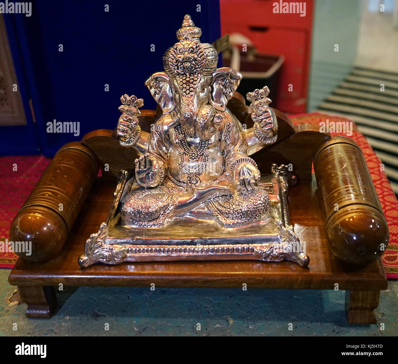 Silver statue of the Hindu elephant God, Ganesha, Traditional style metalwork; Indian 21st century Stock Photo