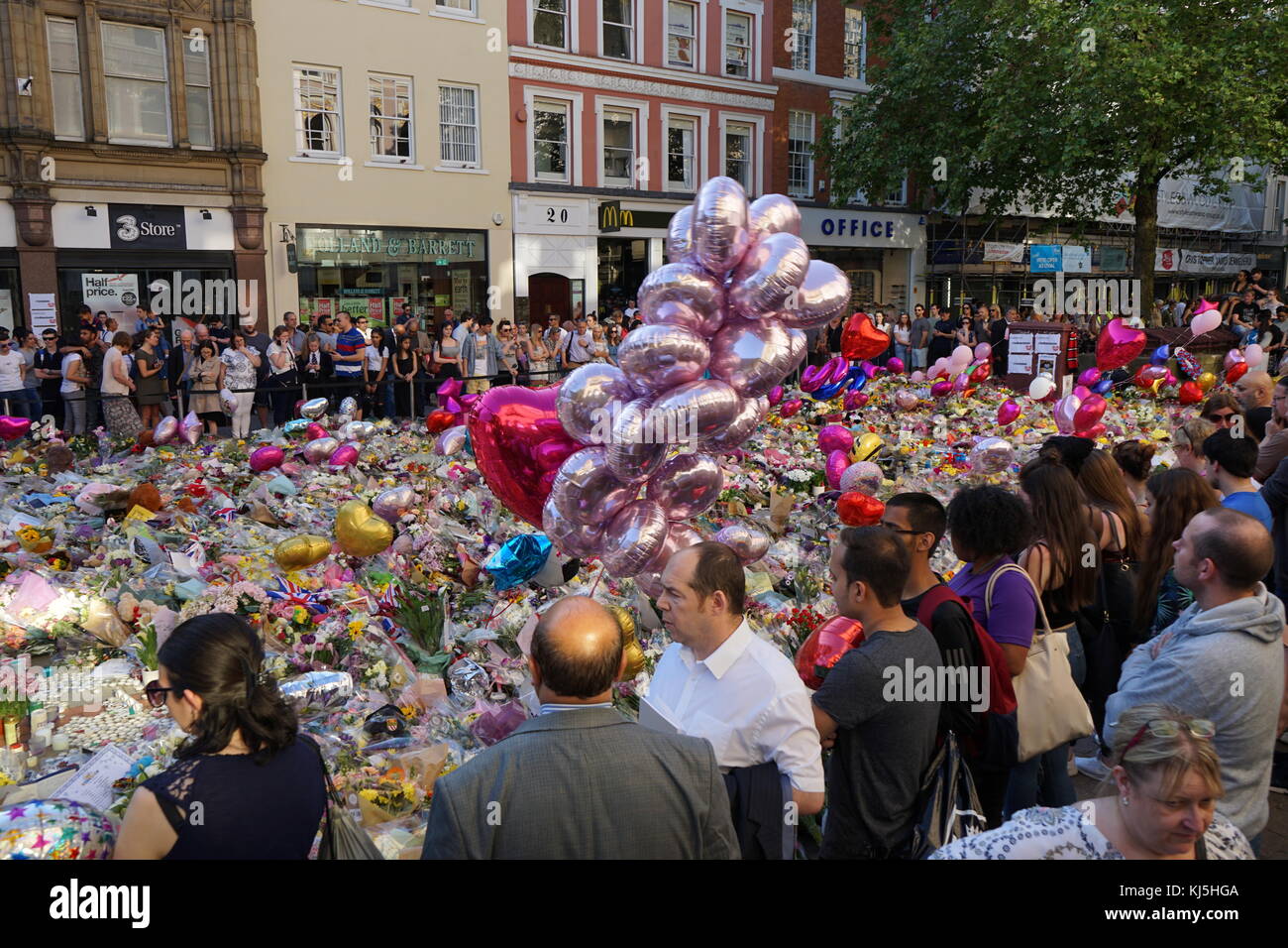Vigil in St Ann's Square, Manchester, during the days following the 22 May 2017, suicide bombing, carried out at Manchester Arena in Manchester, England, following a concert by American singer Ariana Grande. Stock Photo