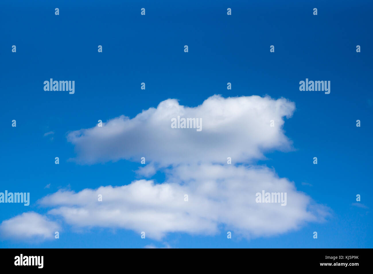 White cumulus clouds are on a blue sky Stock Photo - Alamy