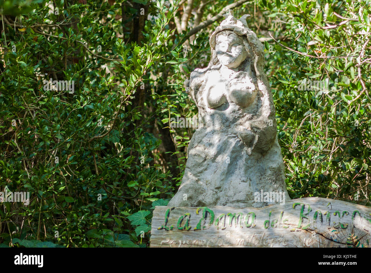 Statue of La Dama dels Boixos (The Lady of Boxwood) in LLuc botanical garden Stock Photo