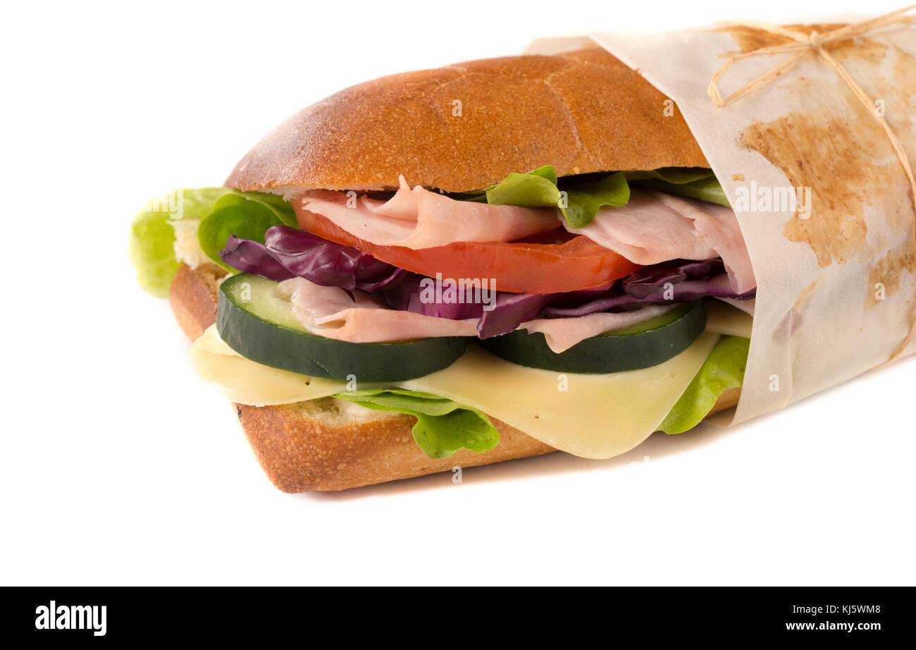 Big stuffed sandwich with ham and cheese isolated on white background ...