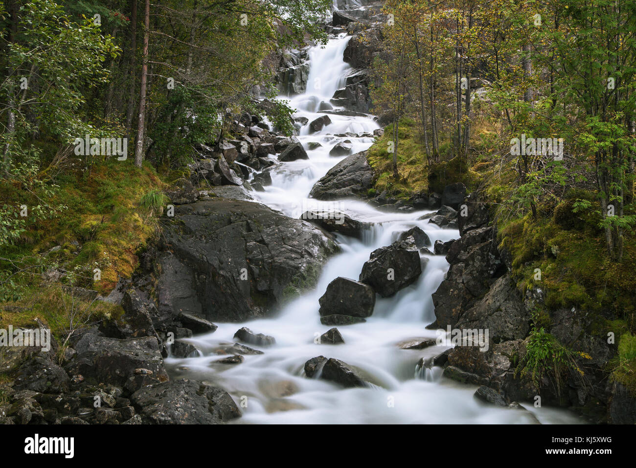 Silky stream from Langfoss Waterfall, Norway. Stock Photo