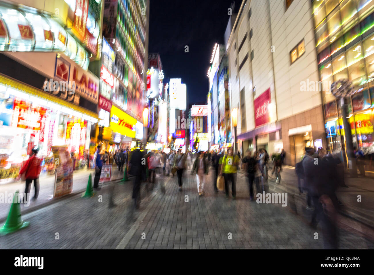 Akihabara, Tokyo, Japan - November 23, 2017 : blur crowds moving on a major shopping area for electronic, computer, anime, games and manga (otaku) goo Stock Photo