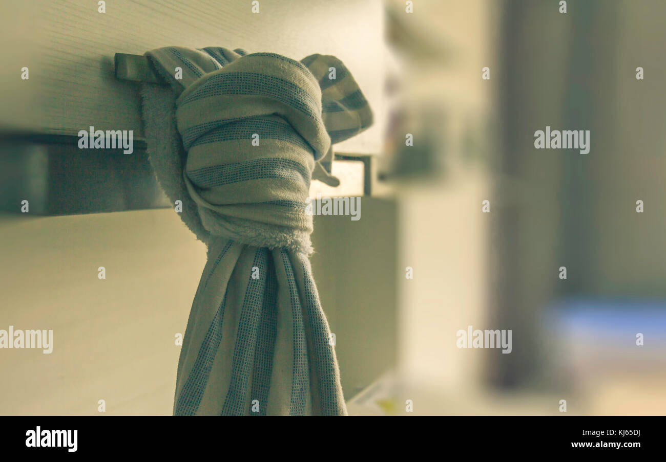 blue white kitchen towel hanging on Stock Photo Alamy