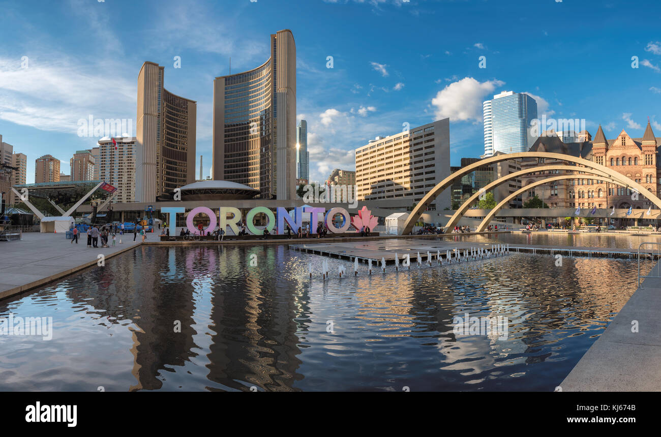 Toronto city hall and Toronto Sign in downtown at sunset Stock Photo
