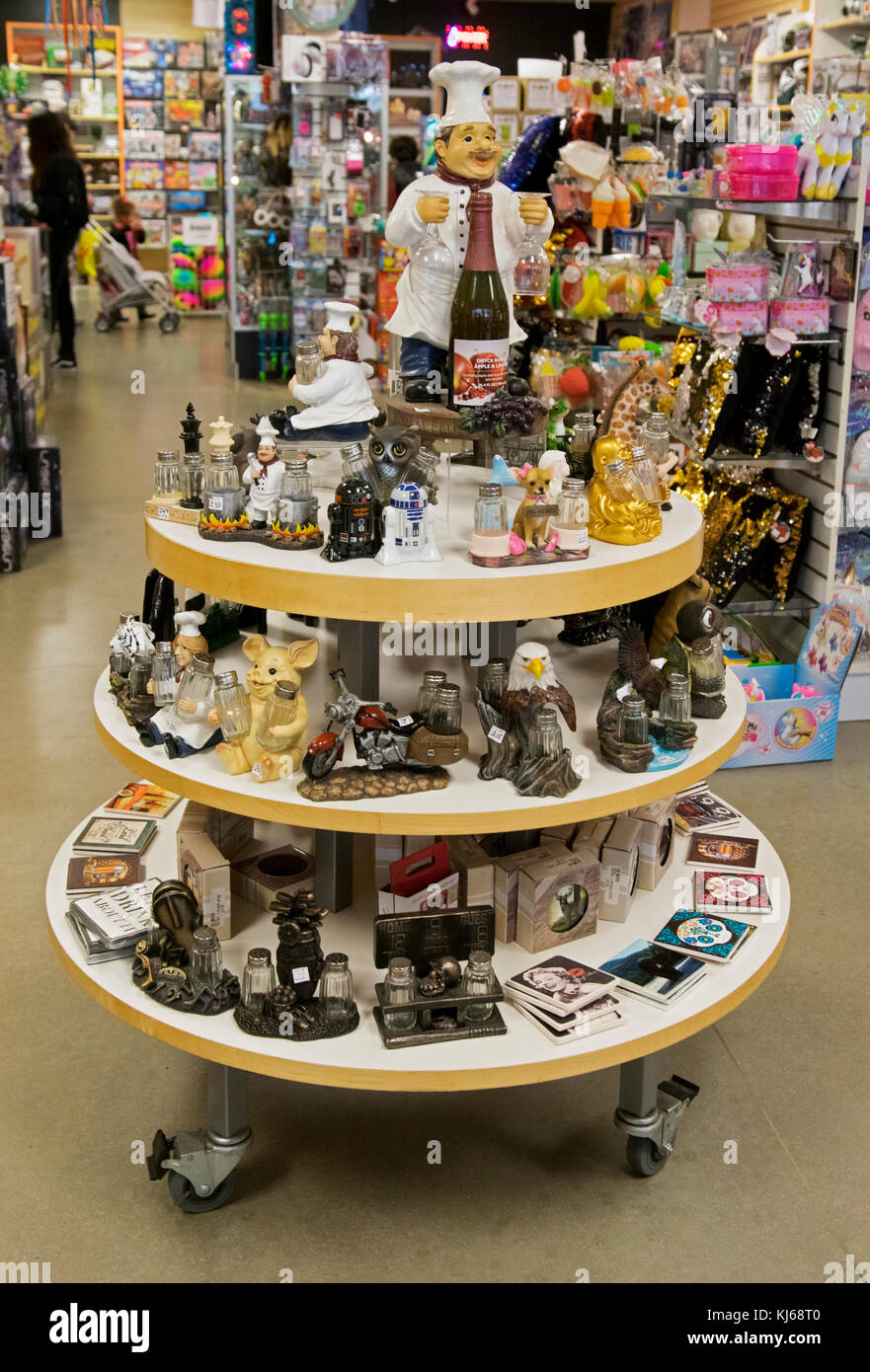 Various clever ceramic salt and pepper shakers for sale at Gizmos & Gadgets at the Tanger Outlet Mall in Deer Park, Long Island, New York. Stock Photo