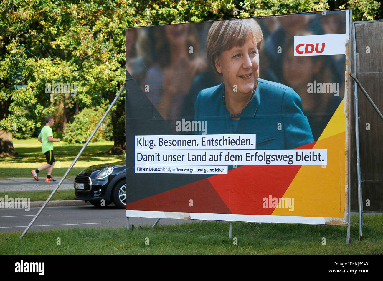 Wahlplakate: Aufkleber auf ein CDU-Wahlplakat: 'Wir werden Euch weiter erfolgreich beluegen', BKin Angela Merkel, 4. September 2017, Berlin. Stock Photo