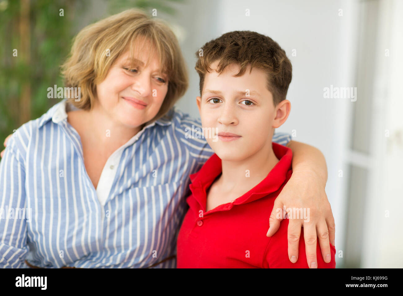 Mid-age woman with teen boy. Happy family concept Stock Photo