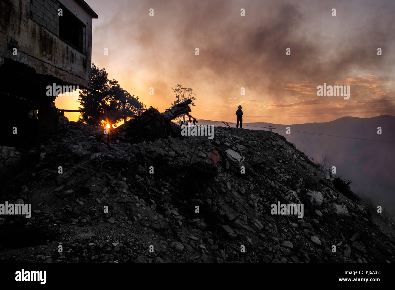 Haredi kid watching the fires in Tzfad Stock Photo