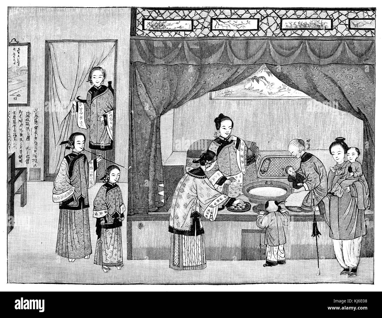 Visit to a new born in China. The midwife holds the child in her arms