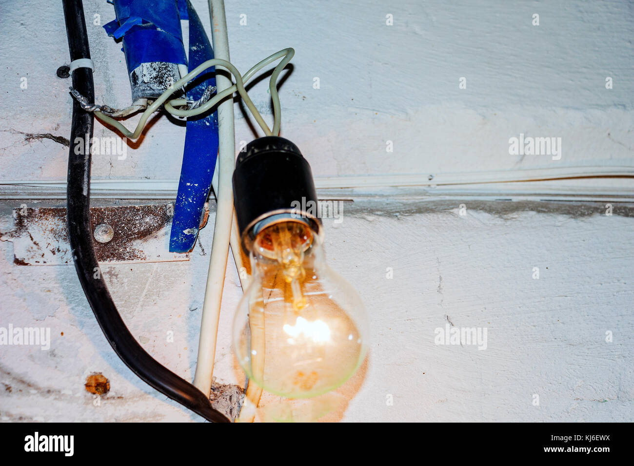 Dangerous connection to the lamp Stock Photo Alamy