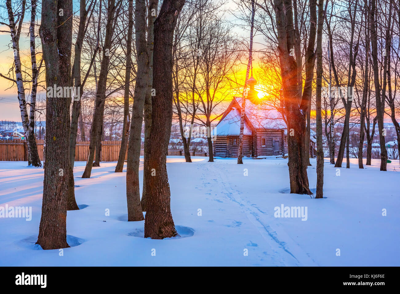 Russian church in winter forest Stock Photo