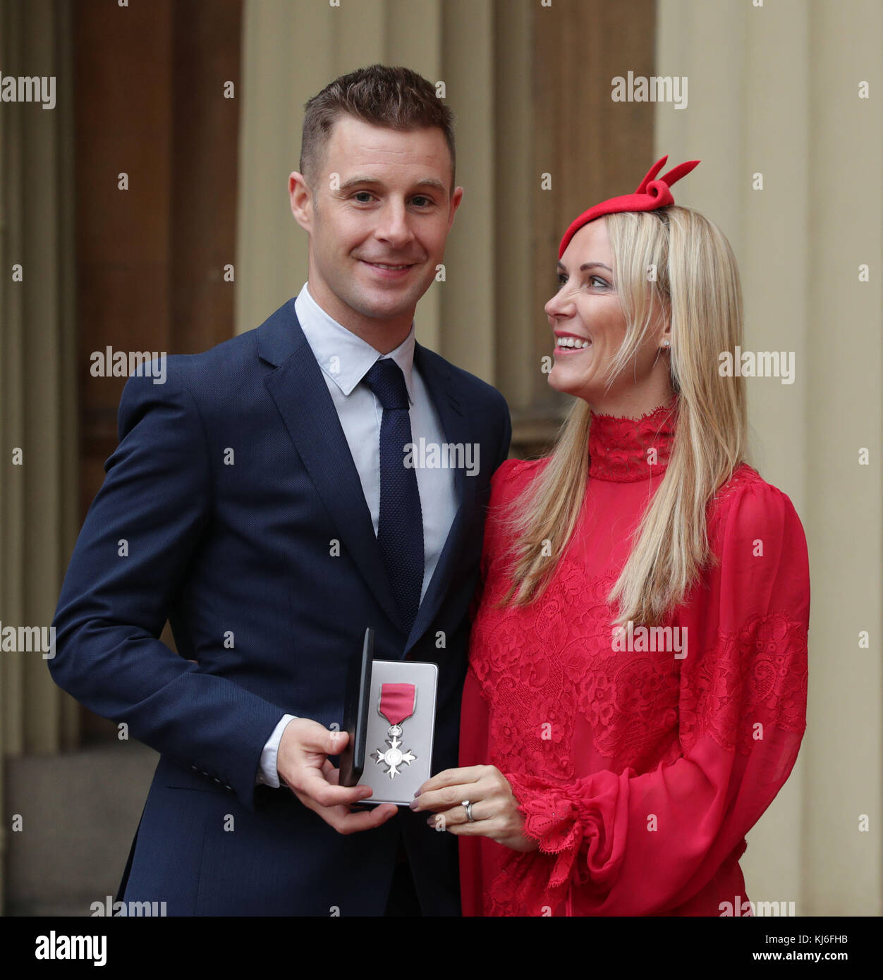 Superbike world champion Jonathan Rea with his wife Tatia, after being presented with an MBE by the Duke of Cambridge, at Buckingham Palace, London. Stock Photo