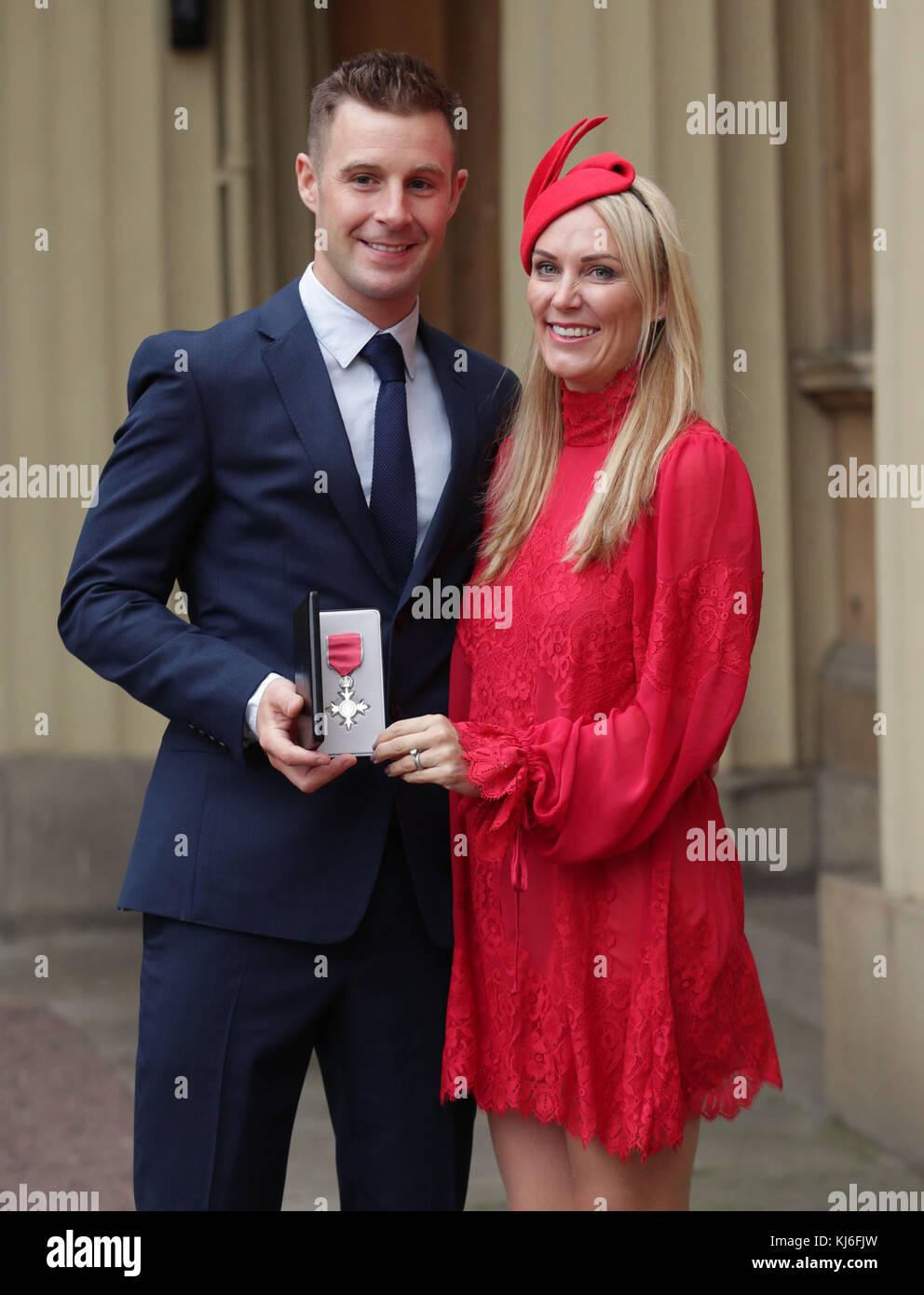 Superbike world champion Jonathan Rea with his wife Tatia, after being presented with an MBE by the Duke of Cambridge, at Buckingham Palace, London. Stock Photo