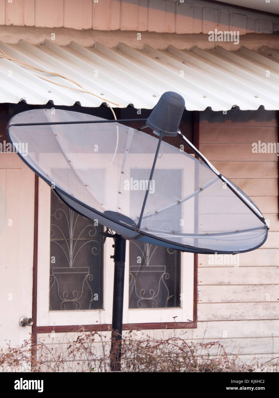 old satellite dish on the roof Stock Photo Alamy