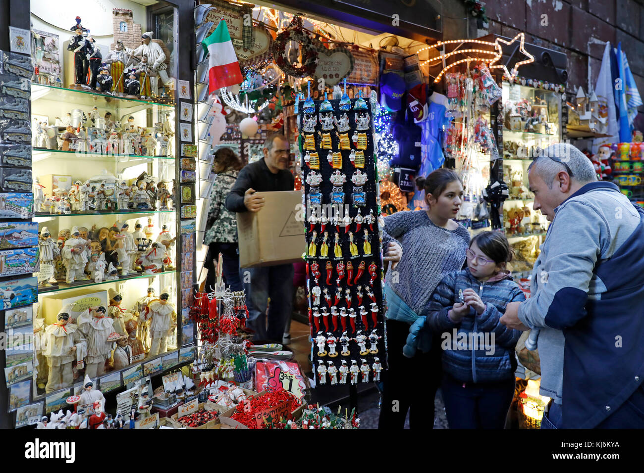 Naples, Italy - November 18, 2017: The Christmas holiday atmosphere in the heart of the city. Via San Biagio dei Librai, exhibition and sale of small  Stock Photo