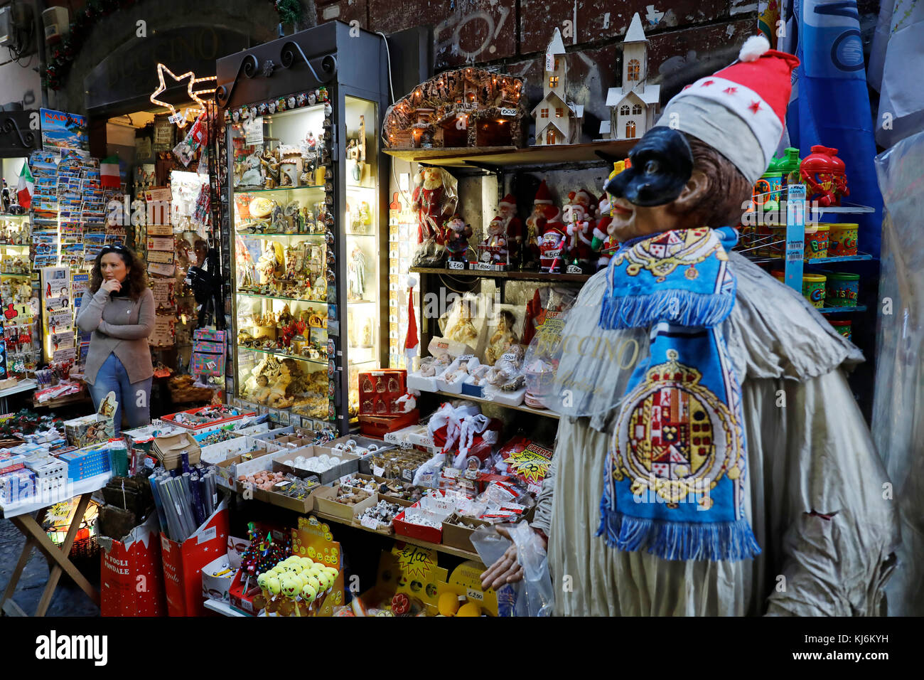 Naples, Italy - November 18, 2017: The Christmas holiday atmosphere in the heart of the city. Via San Biagio dei Librai, exhibition and sale of small  Stock Photo