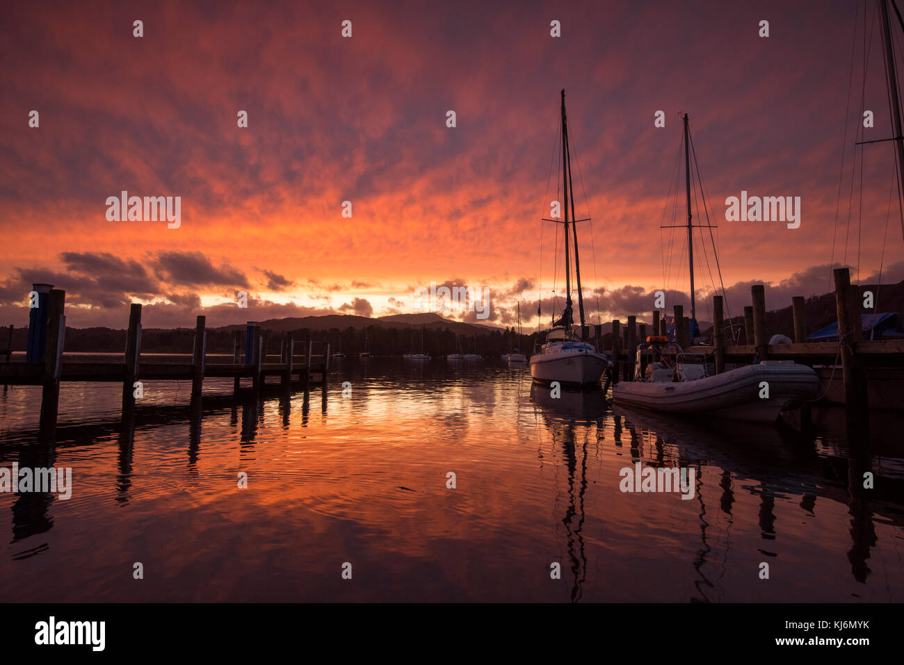 Sunset at Waterhead Pier on Lake Windermere near Ambleside, Cumbria Lake District England UK Stock Photo