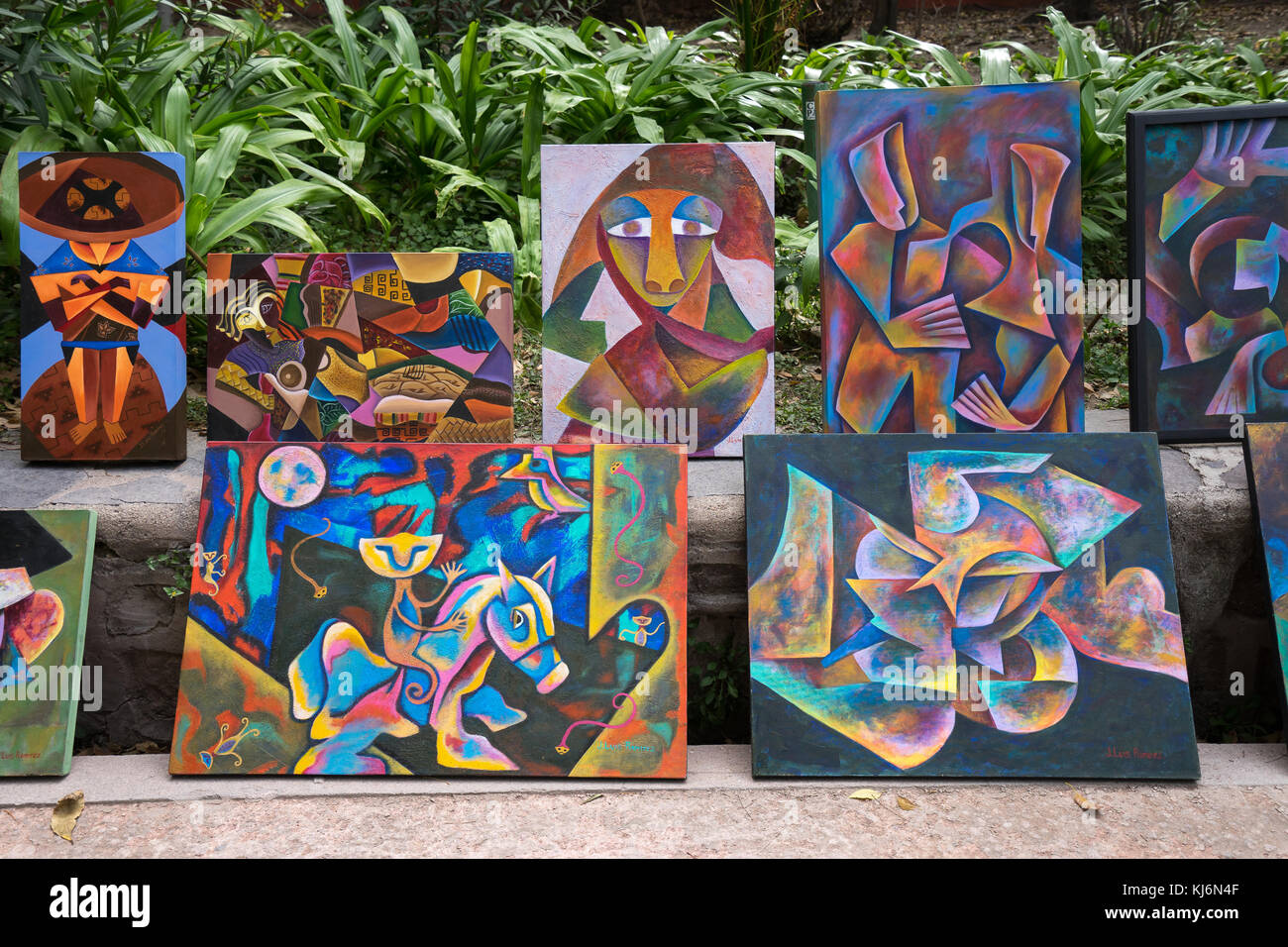 artists exposing their paintings in the park in San Miguel de Allende