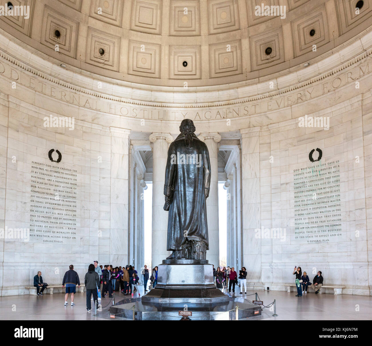 Jefferson Memorial. Visitors round the statue of Thomas Jefferson in the Jefferson Memorial, West Potomac Park, Washington DC, USA Stock Photo