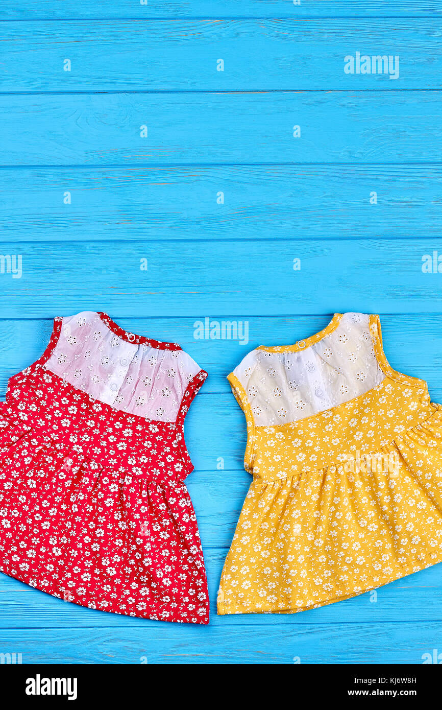 Top view of beautiful baby vintage dresses. Summer cute baby girls ...
