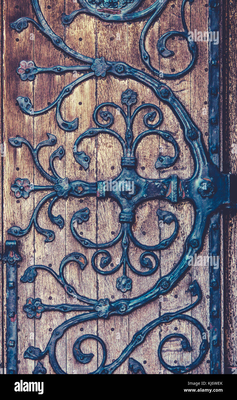 Background Texture Of An Ornate Hinge On A Church Door Stock Photo