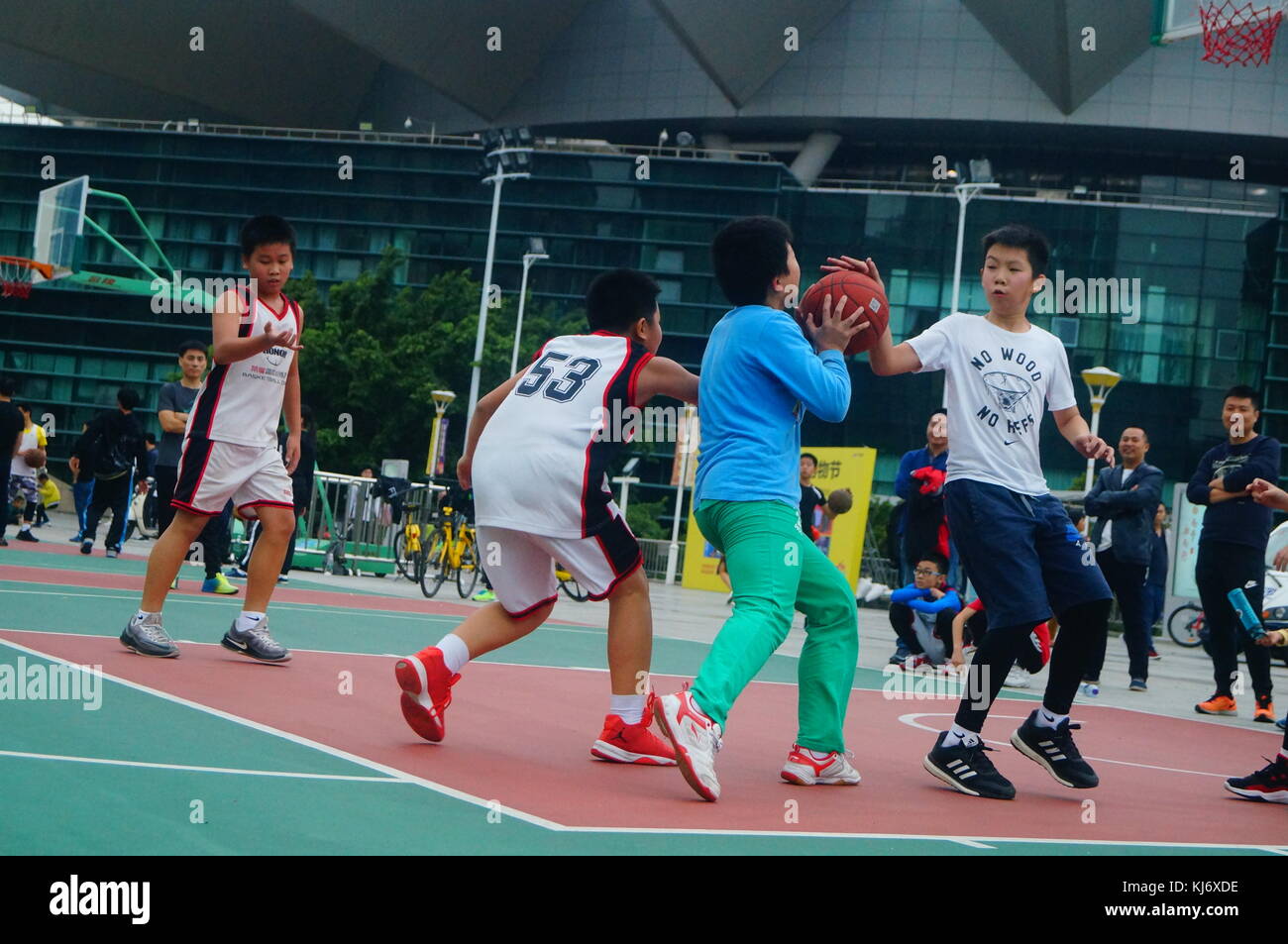Weekend, Chinese children receive regular basketball training in the