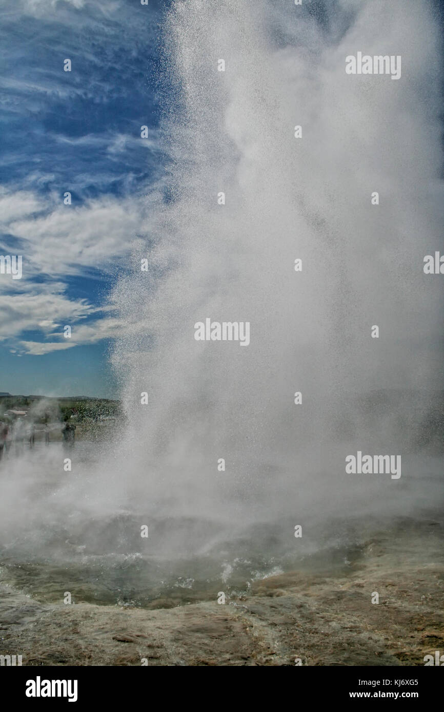 Geyser Strokkur on Iceland erupting hot water and steam Stock Photo - Alamy