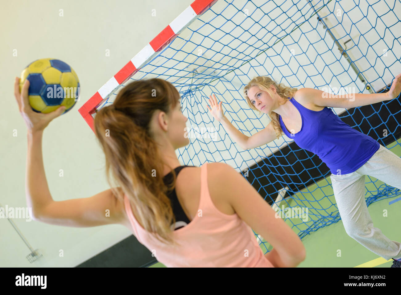 women playing handball Stock Photo