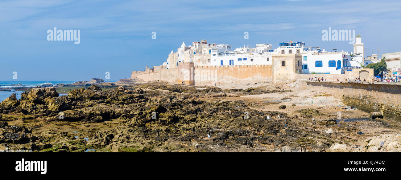 Essaouira, Morocco - September 15 2013: Historical old town of Essaouira with city walls, tourists and Atlantic ocean Stock Photo
