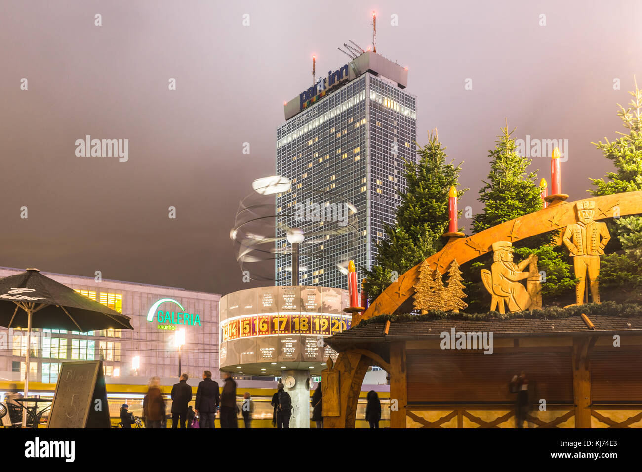 View over Alexanderplatz in Berlin at night with the World time clock (Weltzeituhr) and the Park Inn Hotel and the Kaufhaus Galeria, Berlin, Germany Stock Photo