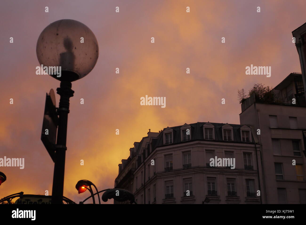 Strange orange sky over Paris. Stock Photo