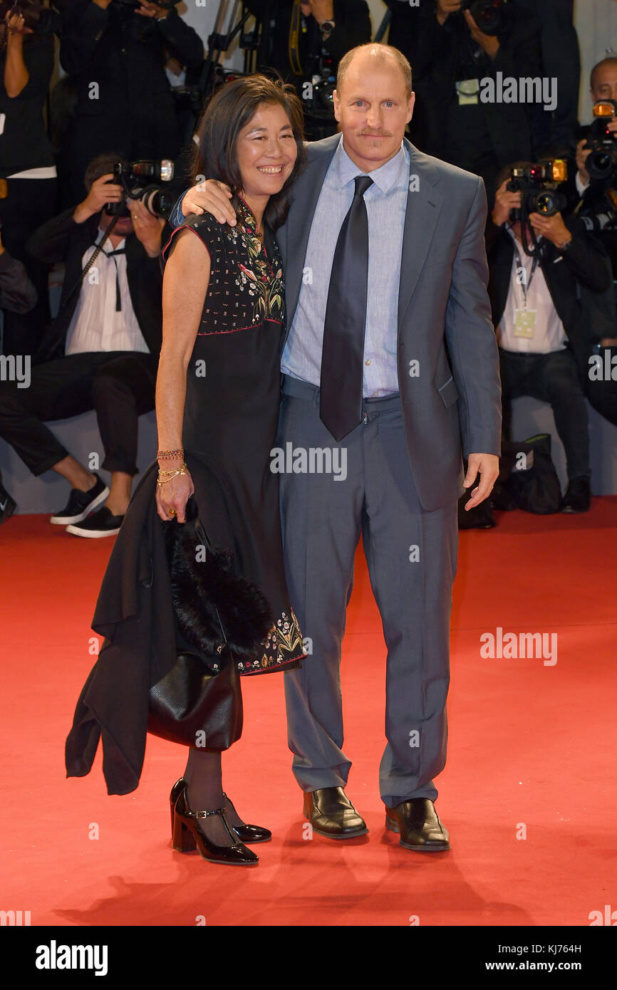 Woody Harrelson and his wife Laura Louie attend the premiere for Three
