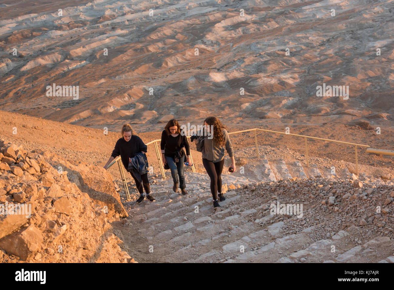 Tourists climbing on steps, Masada, Judean Desert, Dead Sea Region 