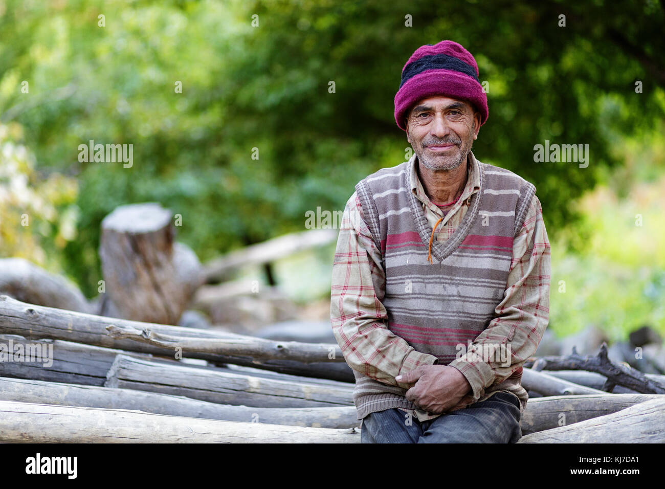 Aryan man on his backyard, Dah Hanu, Ladakh, JAmmu and Kashmir, India. Stock Photo