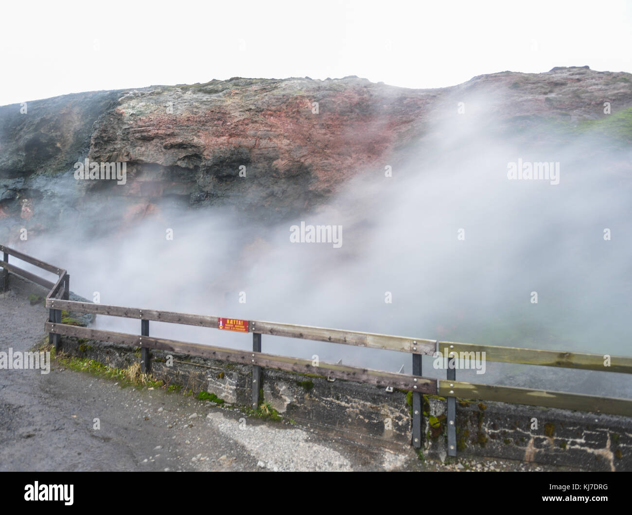 Deildartunguhver, a geothermal hotspring in Reykholtsdalur, Iceland. It has a very high flow rate for a hot spring and water emerges at near boiling.  Stock Photo
