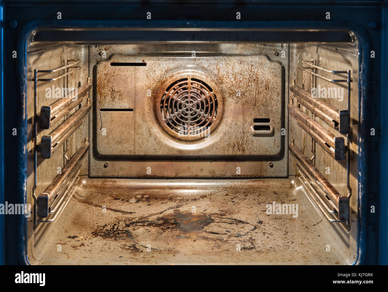 Dirty open oven messy kitchen, Compulsive Hoarding Syndrom Stock