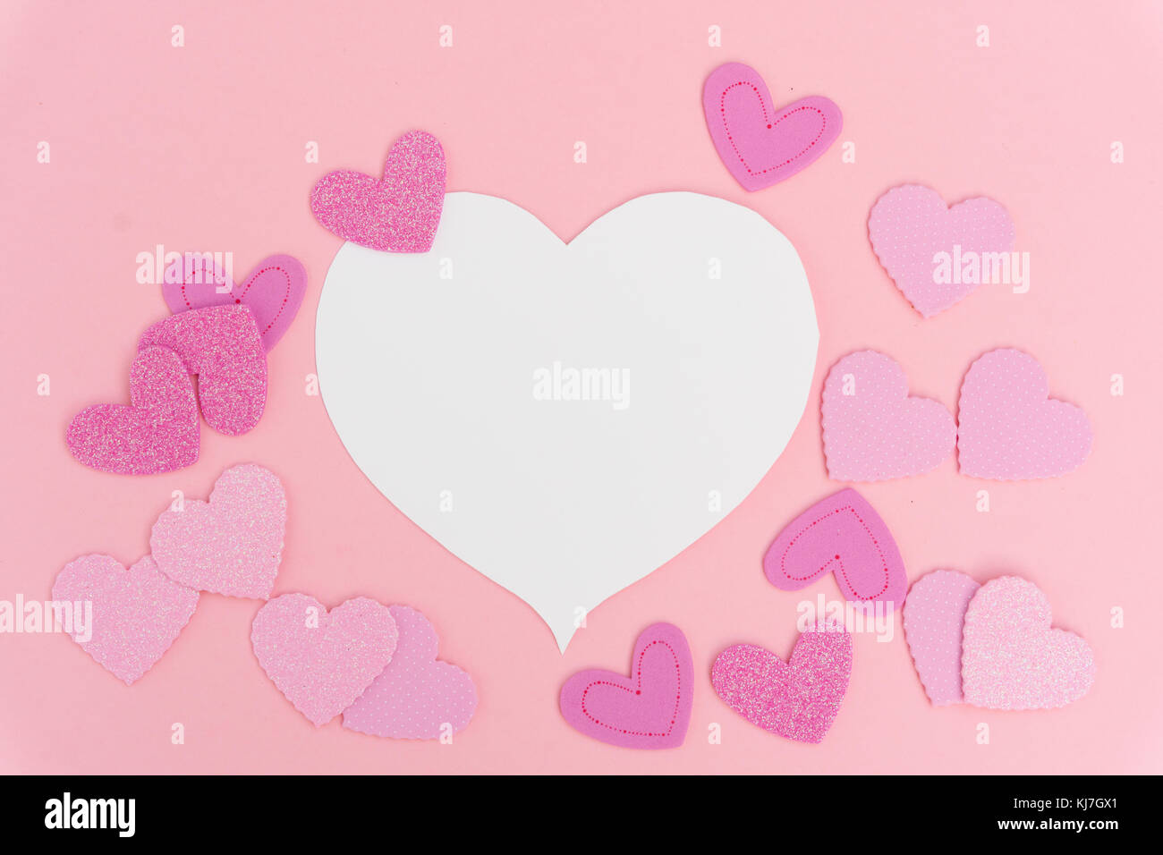 Valentines day frame with hearts on pink background with copy space ...