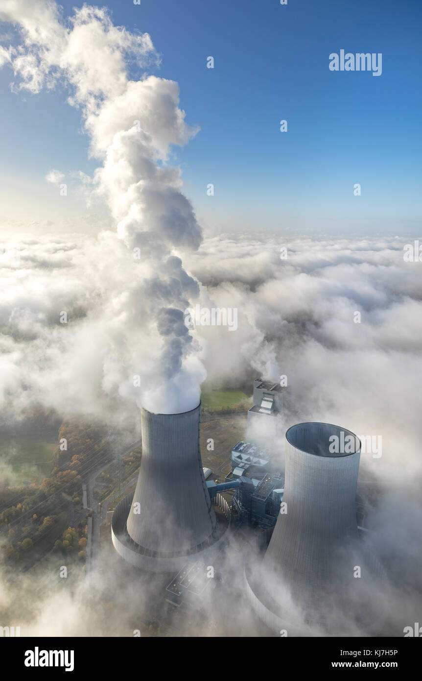 RWE Westfalen power plant, morning fog, clouds, the power plant protrudes from the low cloud cover, Hamm, Ruhr area, North Rhine-Westphalia, Germany,  Stock Photo