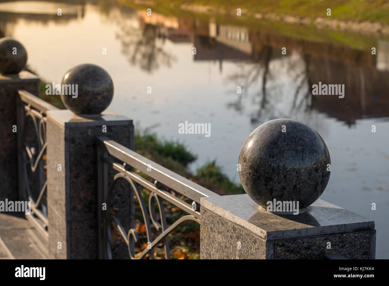 water, summer, nature, sun, spring, river, reflection in water, granite, autumn, yellow, sunset, round, stone, marble, soft tone, reflection, canal Stock Photo