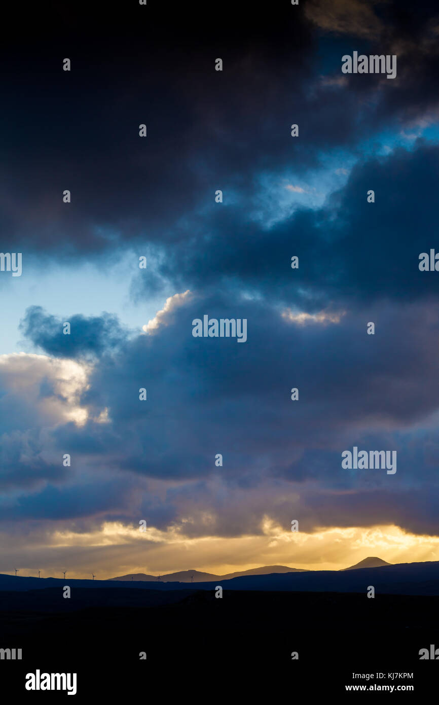 View of distant hills in a dramatic sky, Skye, Scotland UK Stock Photo