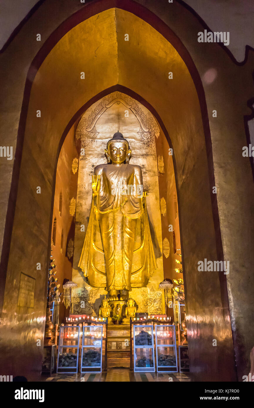 Standing Buddha – Gautama – West facing,  the Ananda Temple, Old Bagan, Myanmar Stock Photo