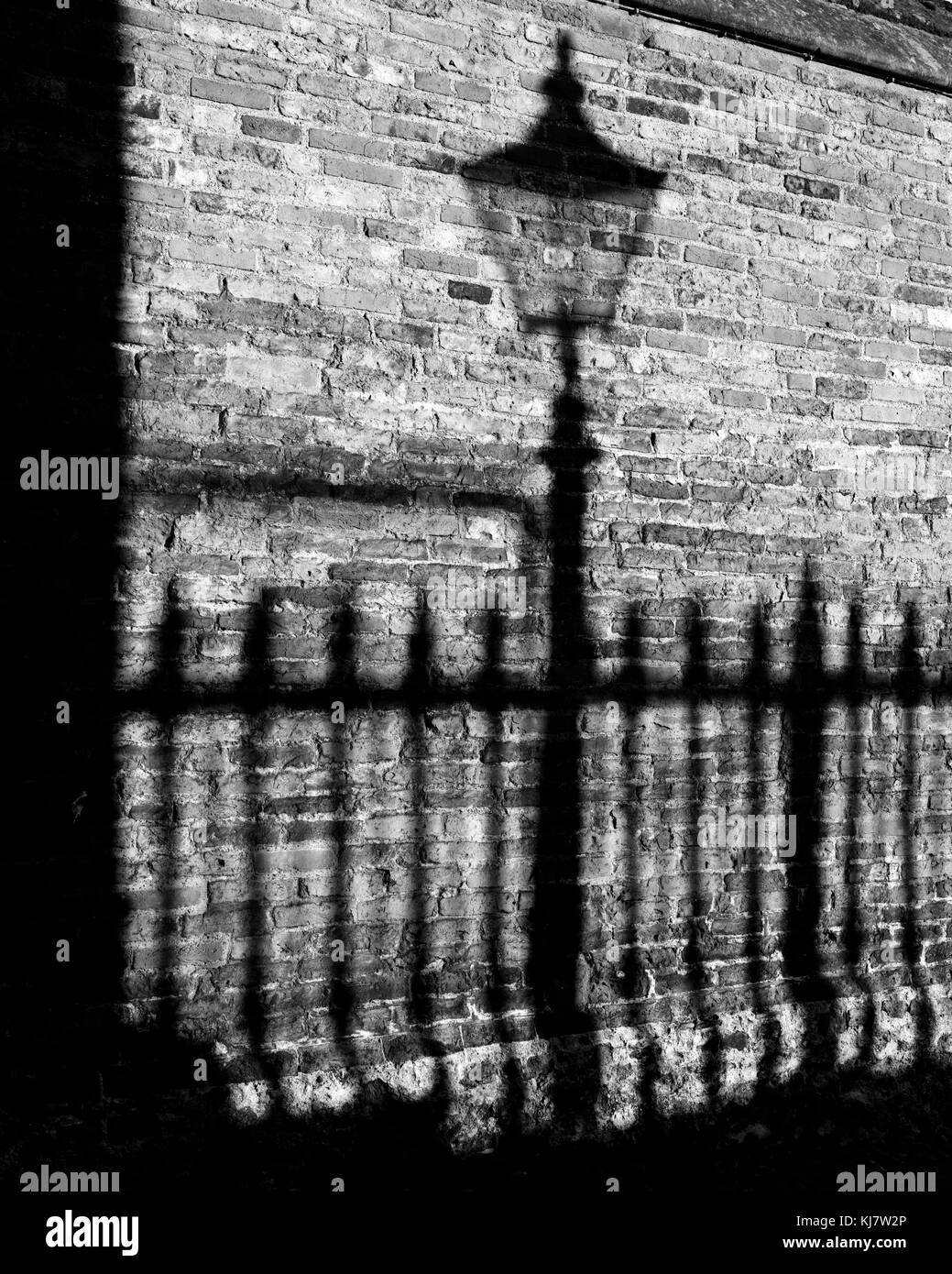 Shadow of lampost in Senate House Passage Cambridge Stock Photo