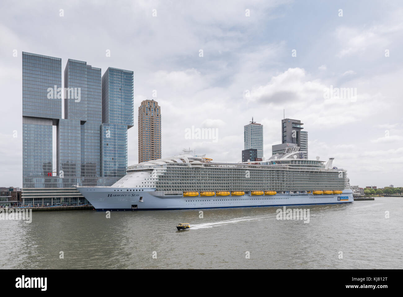 ROTTERDAM, THE NETHERLANDS - MAY 24, 2016: The largest cruise ship in the world Harmony of the Seas moored at the Wilhelminapier in Rotterdam on May 2 Stock Photo