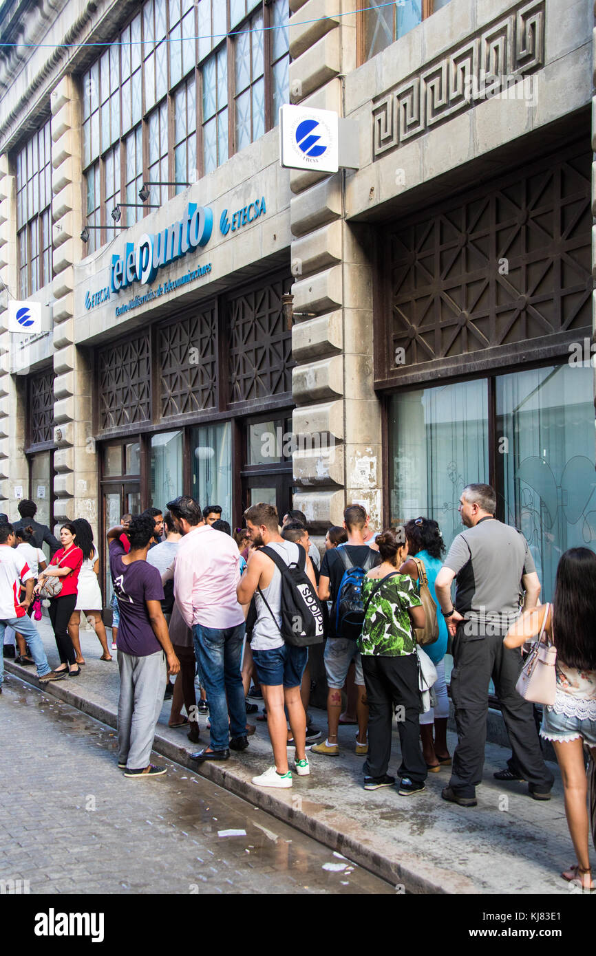 Line for wifi cards outisde Telepunto, Etecsa office, Havana, Cuba Stock Photo