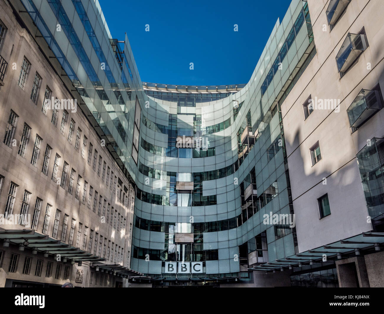 BBC headquarters, a renovated Portland Stone edifice with cutting-edge studios and a public piazza. Portland Place, London, UK Stock Photo