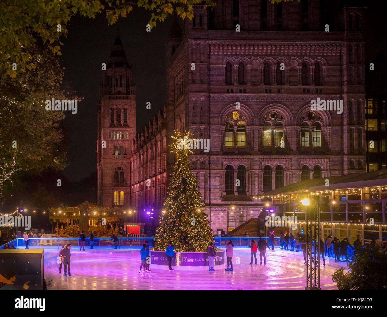 Christmas ice rink at the Natural History Museum, London, UK Stock