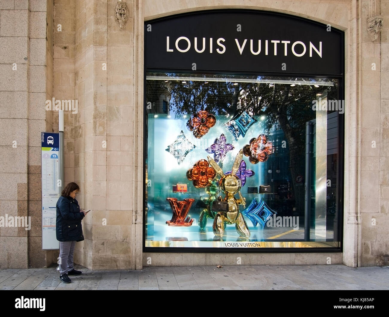 Exterior of Louis Vuitton store with original artwork window display in  Barcelona, Catalonia, Spain, ES Stock Photo - Alamy
