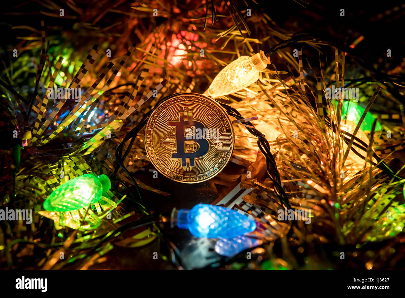 Gold bitcoin decoration on christmas tree. Bitcoin gold christmas. Gold  coin of Bitcoin in the spruce branches. A gift for the new year capabality  Stock Photo - Alamy